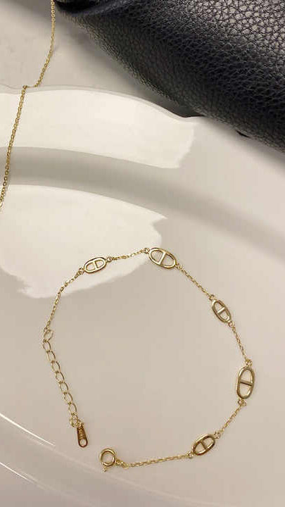 Gold Bracelet with Infinity Link Accents